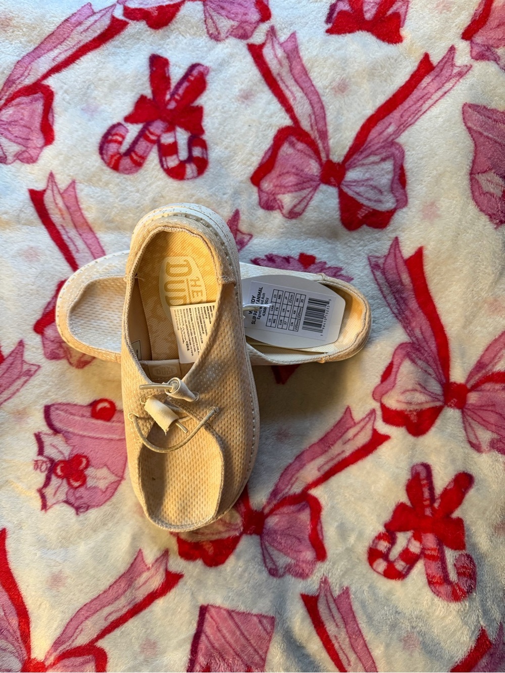 Hey Dude women’s Beige Canvas Slip-On Shoes